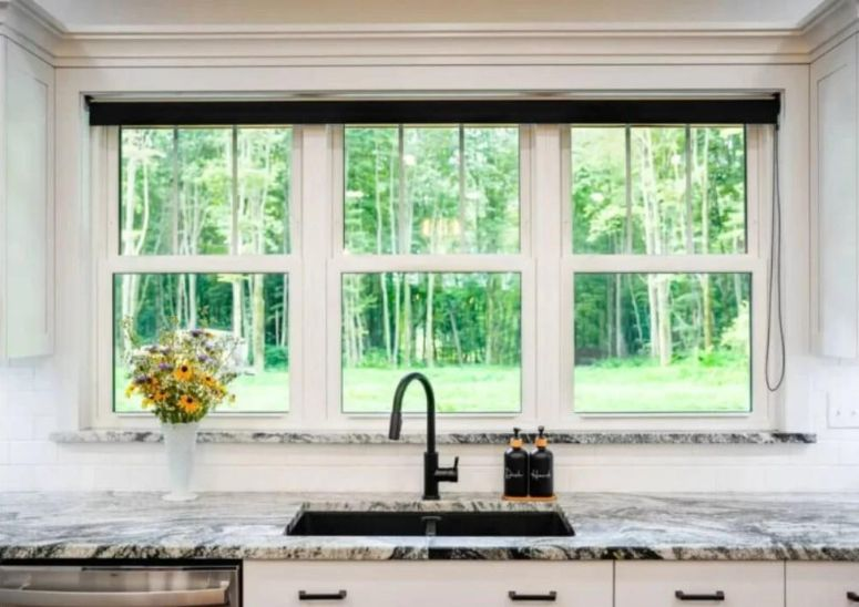 ProVia white Endure double-hung vinyl windows installed, energy efficient and classic design