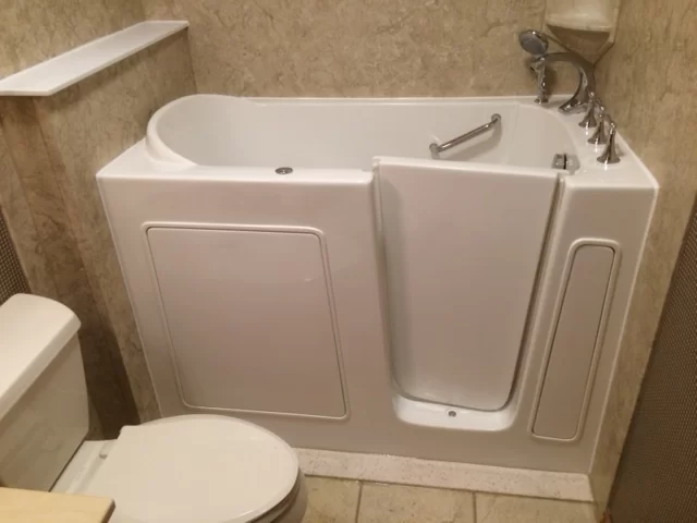 Modern bathroom remodeling project in Nixa, MO featuring elegant tile work, updated fixtures, and a clean contemporary design