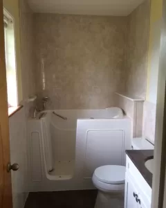 Beautifully remodeled bathroom in Ozark, MO featuring custom tile work, updated fixtures, and a modern, functional design