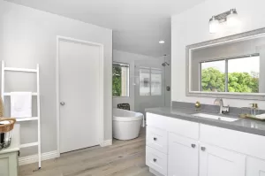 Contemporary bathroom with a modern vanity, walk-in shower, and stylish finishes for bathroom remodeling in Nixa, MO.